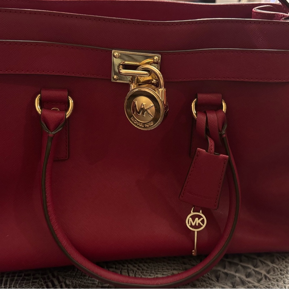 Michael Kors Burgundy Satchel with Gold Accents.  Hamilton east west large.